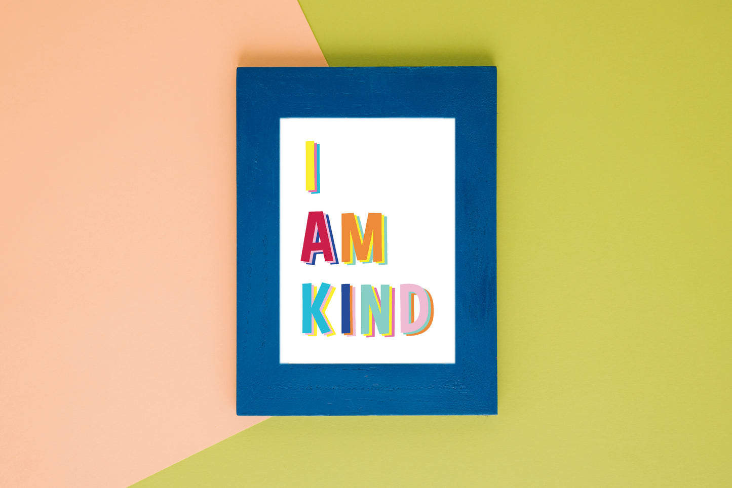 i am kind mock up with a blue frame