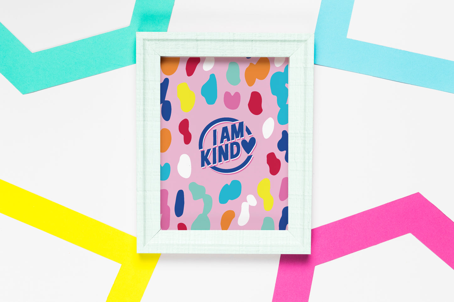 i am kind poster in pink with a bold pattern in white frame