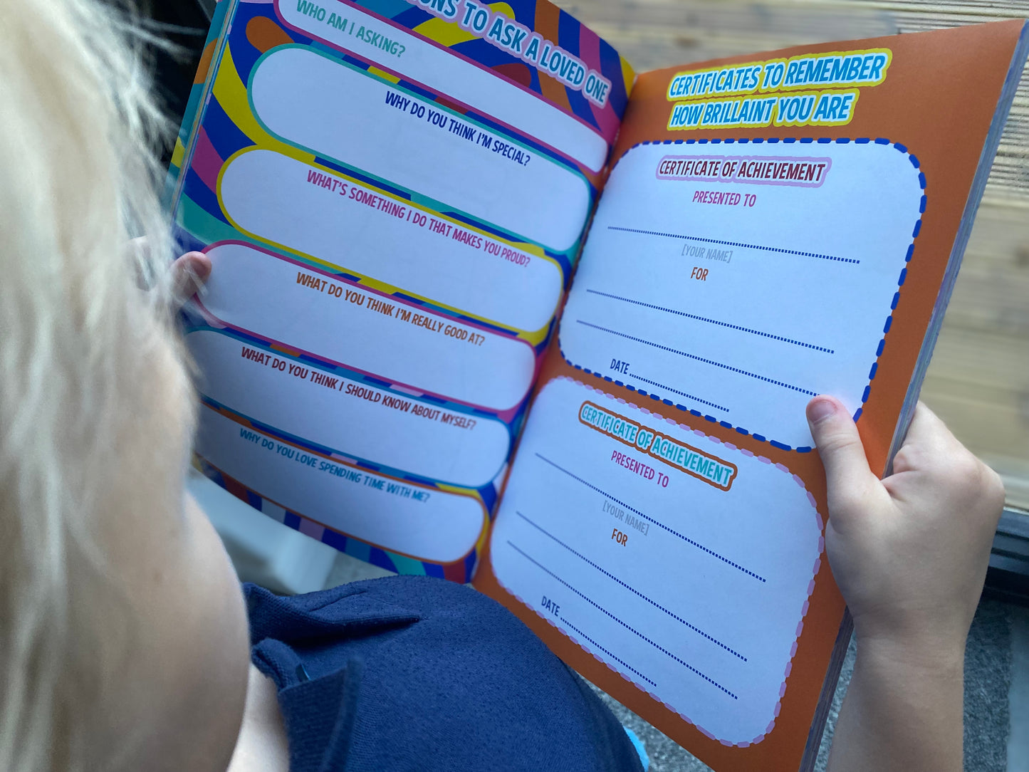 young boy reading the this is me journal