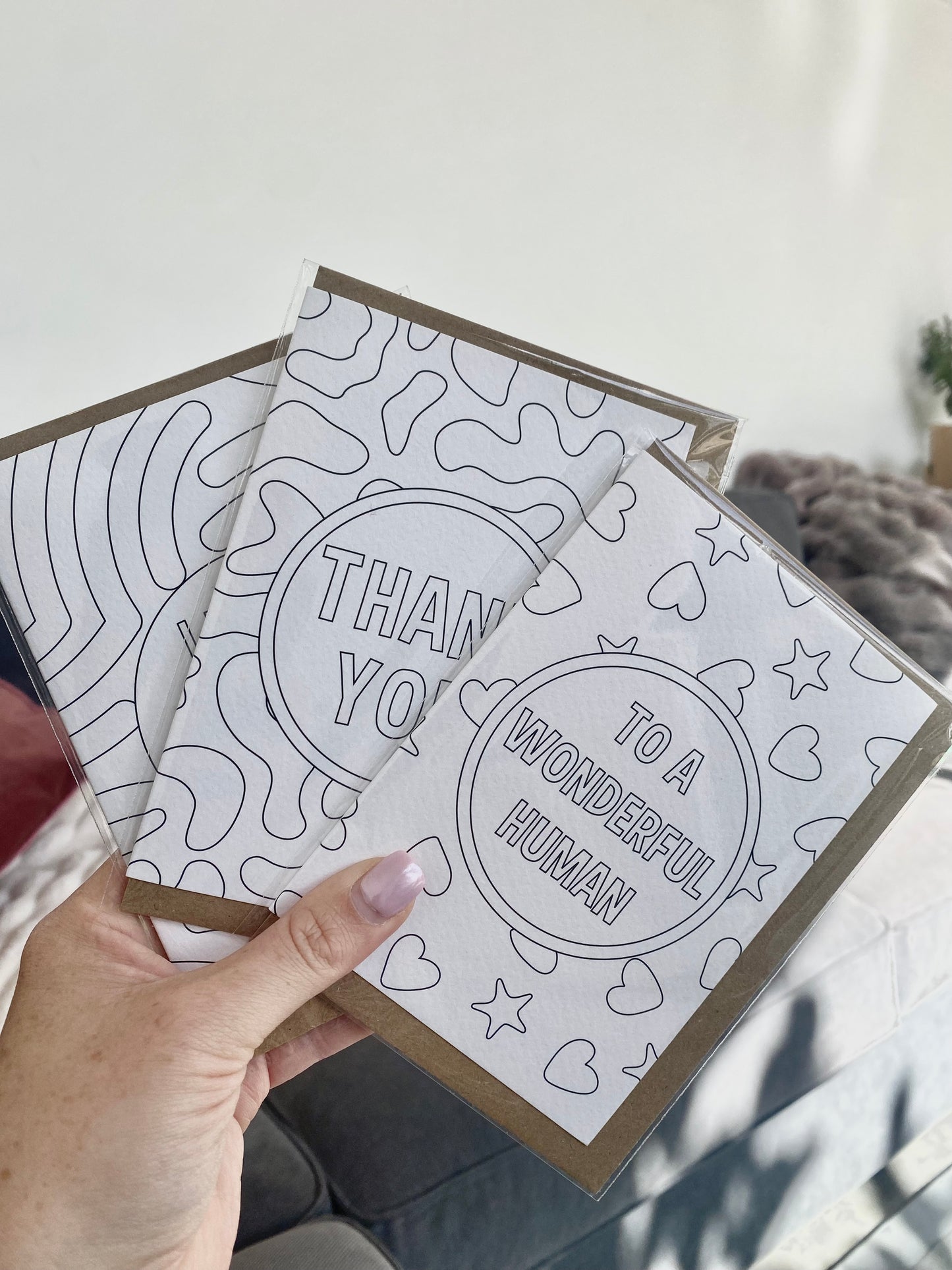 collection of colouring in cards with different messages to be coloured in.