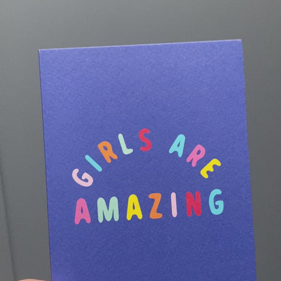 video of blues girls are amazing card being show to the camera